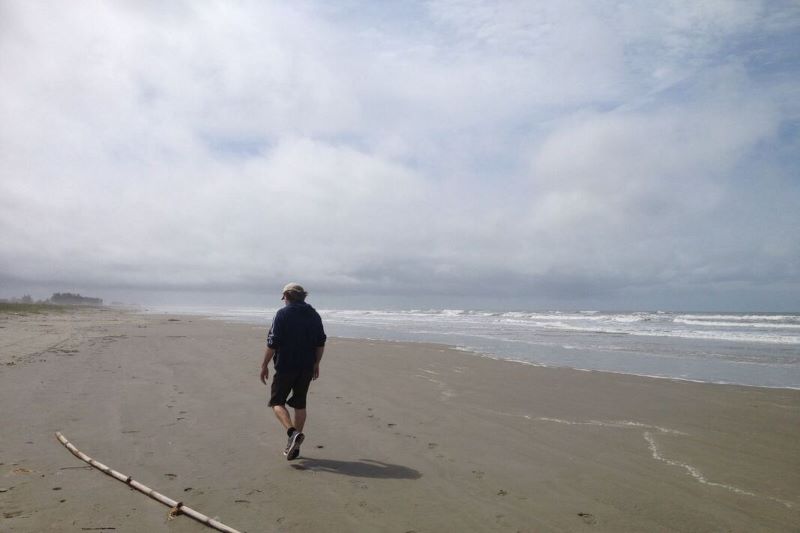 A person walking along the beach, from the personal archive